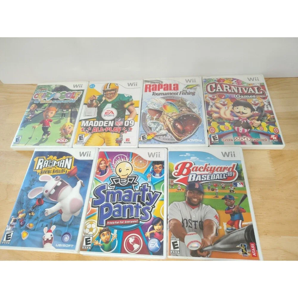 Nintendo Wii Game Lot Of 7 Rayman Madden 09 Golf Smarty Pants Fishing Carnival